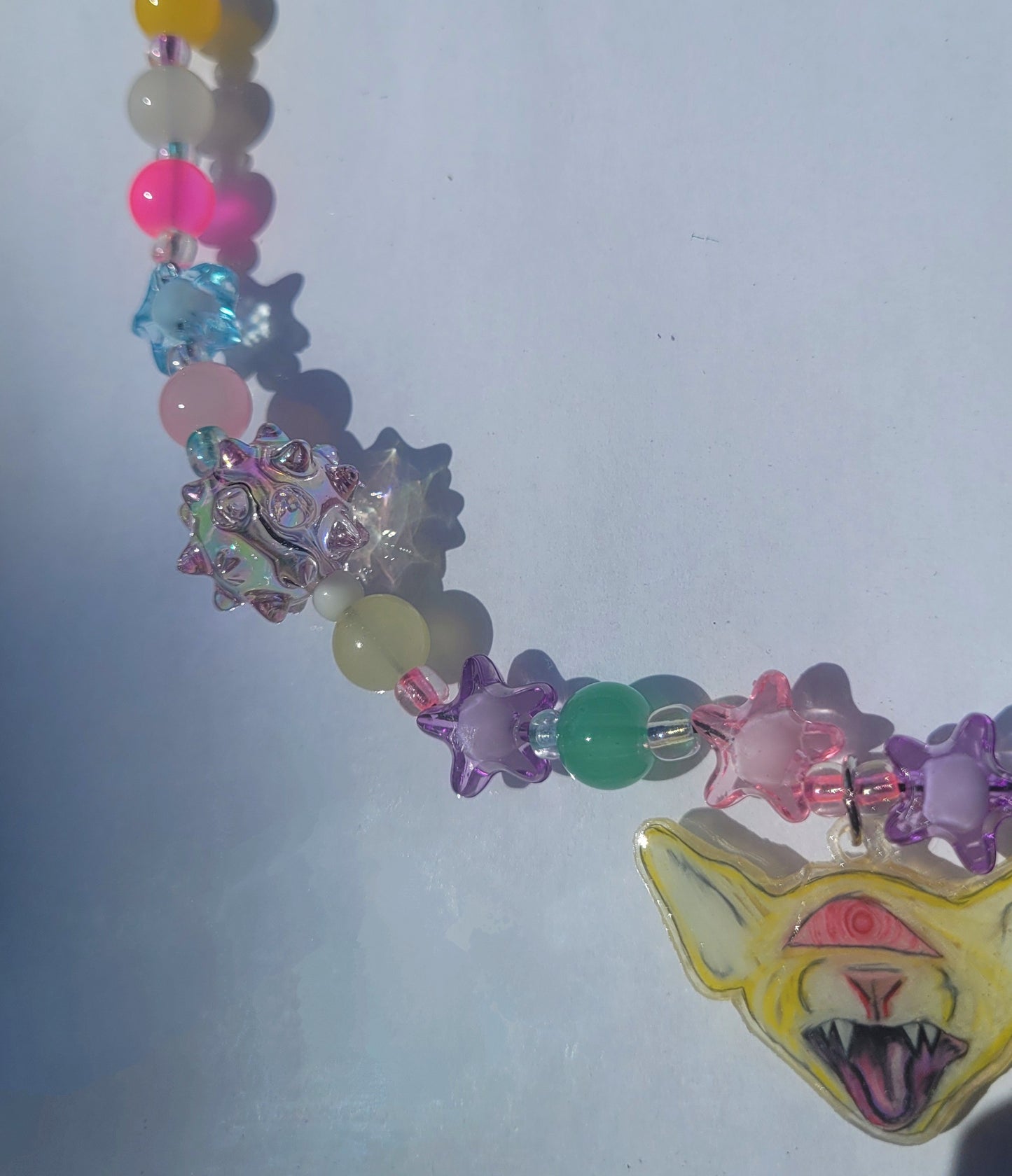 Cat cyclops necklace